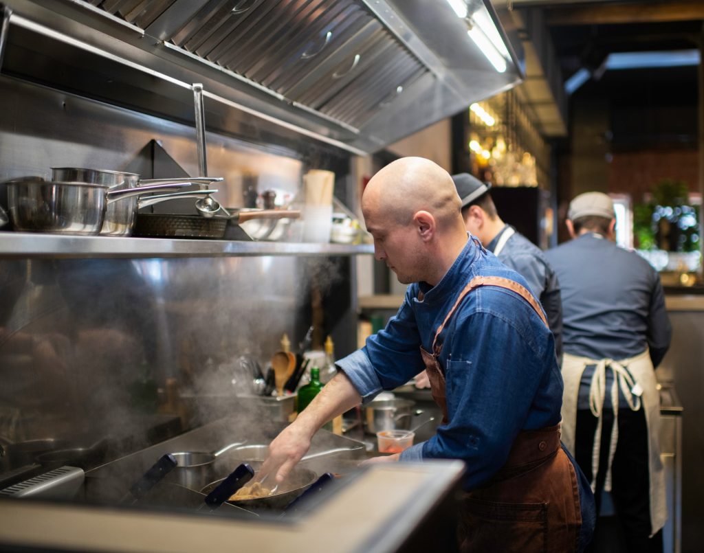 Chef Working In The Kitchen in the restaurant