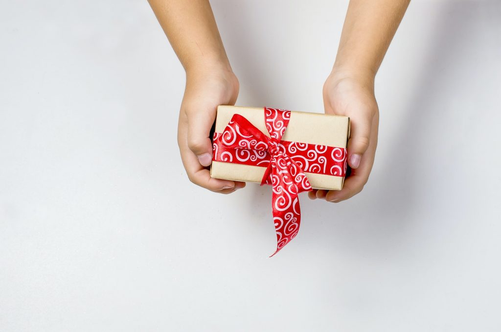 baby packs a handmade gift. Christmas gifts,